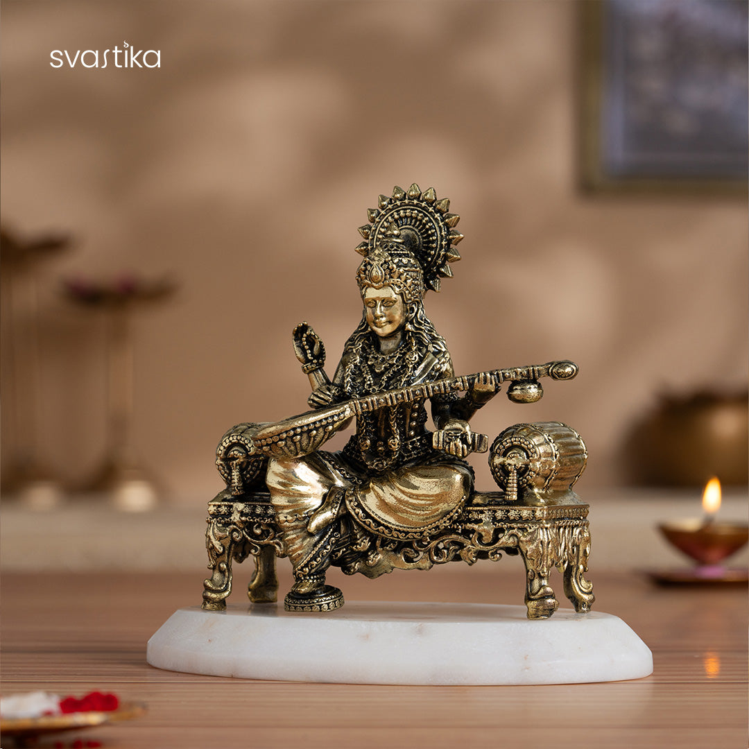 Brass Saraswati Idol Playing Veena On Singhasan 